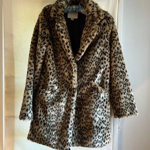 Faux fur coat. Warm, cozy and chic - all at the same time.